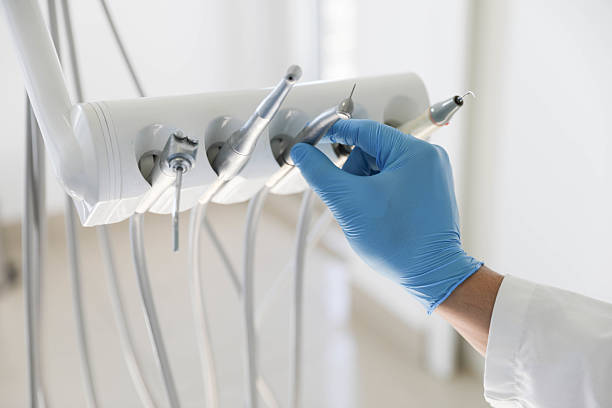 Professional Tooth Extraction technician working in Liberty County County, TX